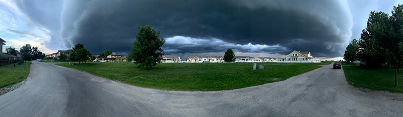 neighborhood with cloudy sky