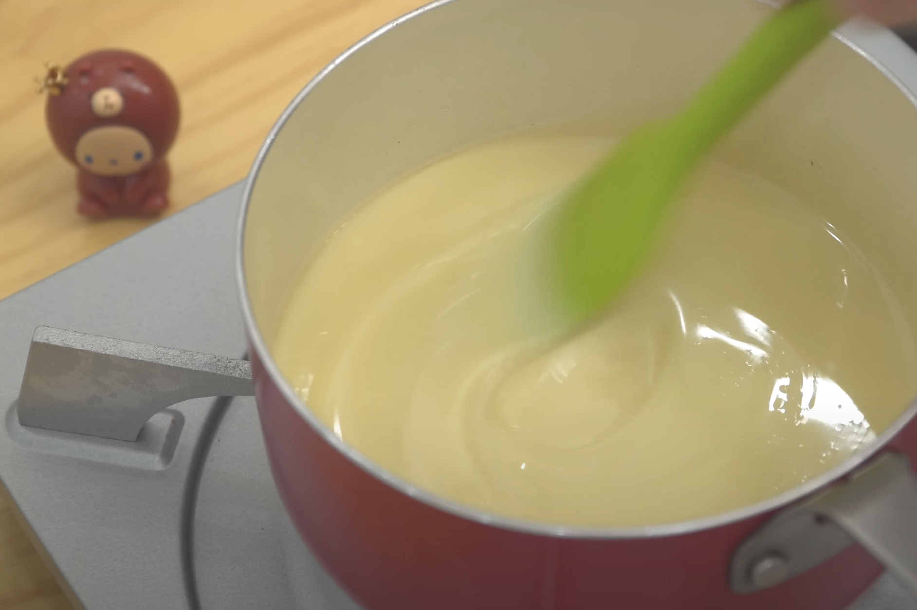 condensed milk in a pot on the stove